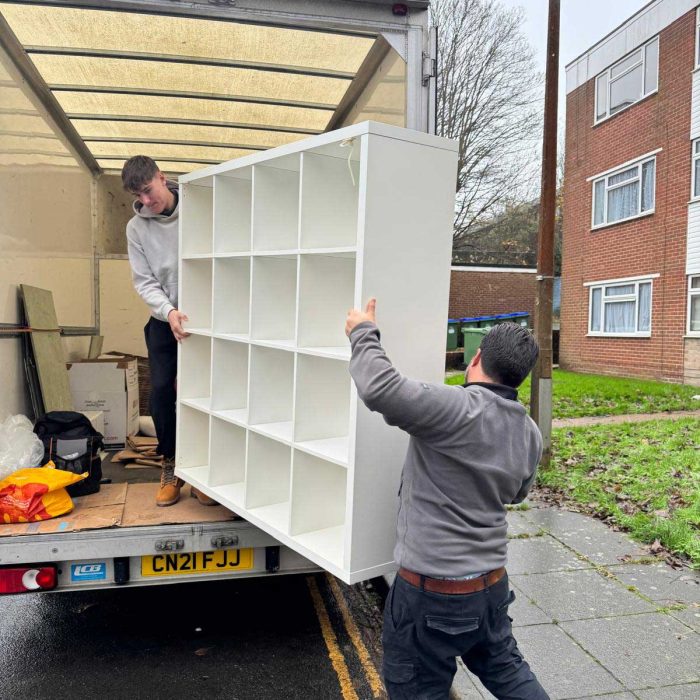 two-men-moving-out-furniture